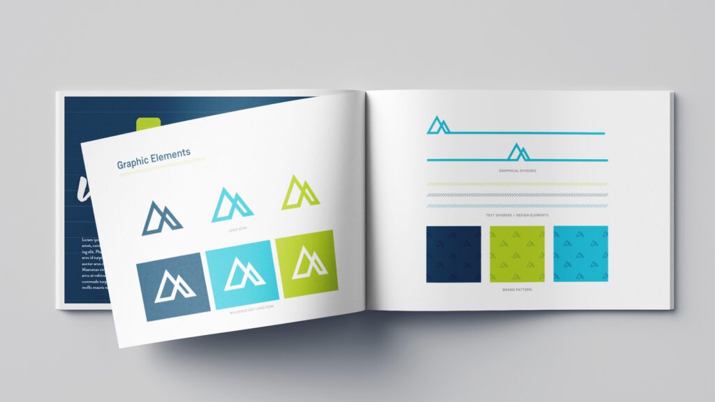 An opened Avenu Health "Style Guide" booklet, featuring two pages with text that reads "Graphic Elements" and icons