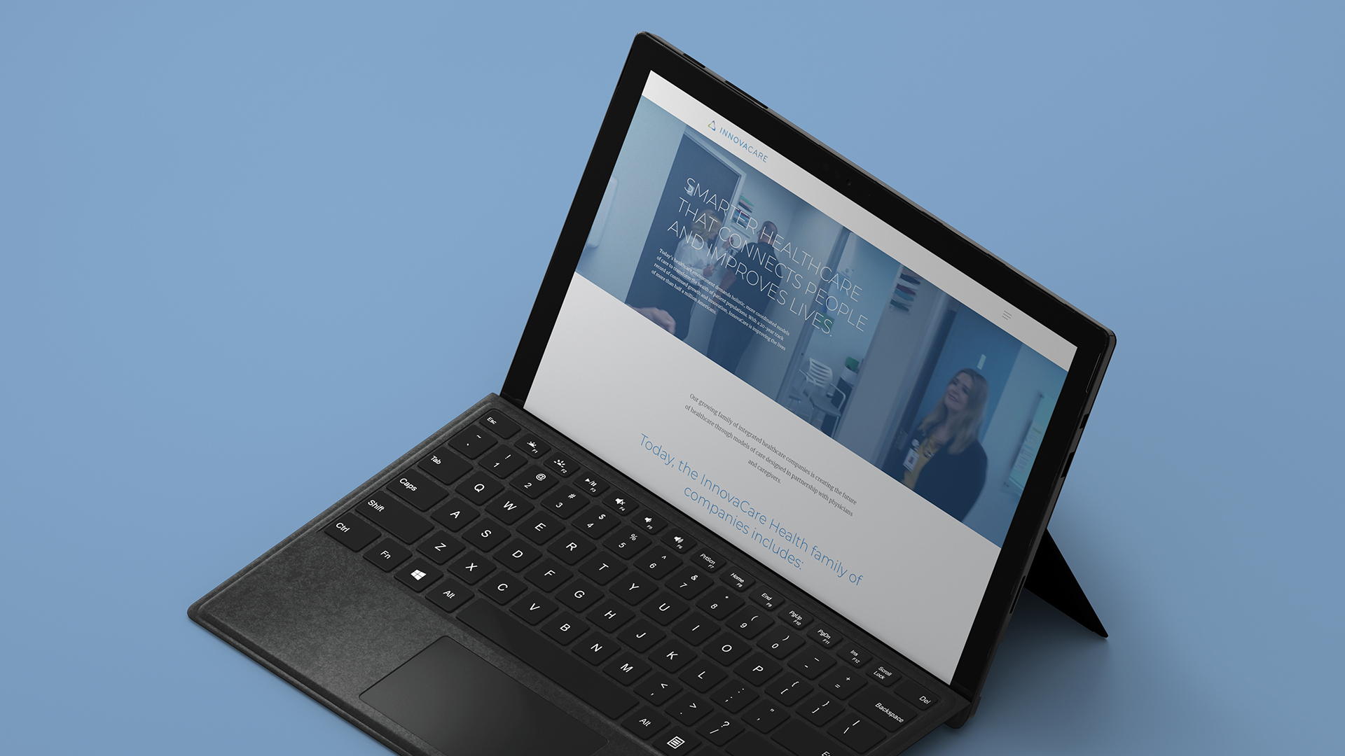 Innovacare-Website-Mockup-Resized A tablet connected to a keypad with the screen displaying a webpage from Innovacare Health