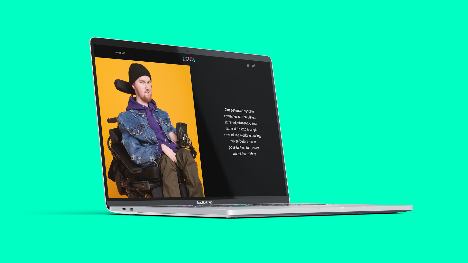 LUCI-Web-Mockup-B-Resized A laptop with the screen displaying a webpage from LUCI and an image of a man in a wheelchair